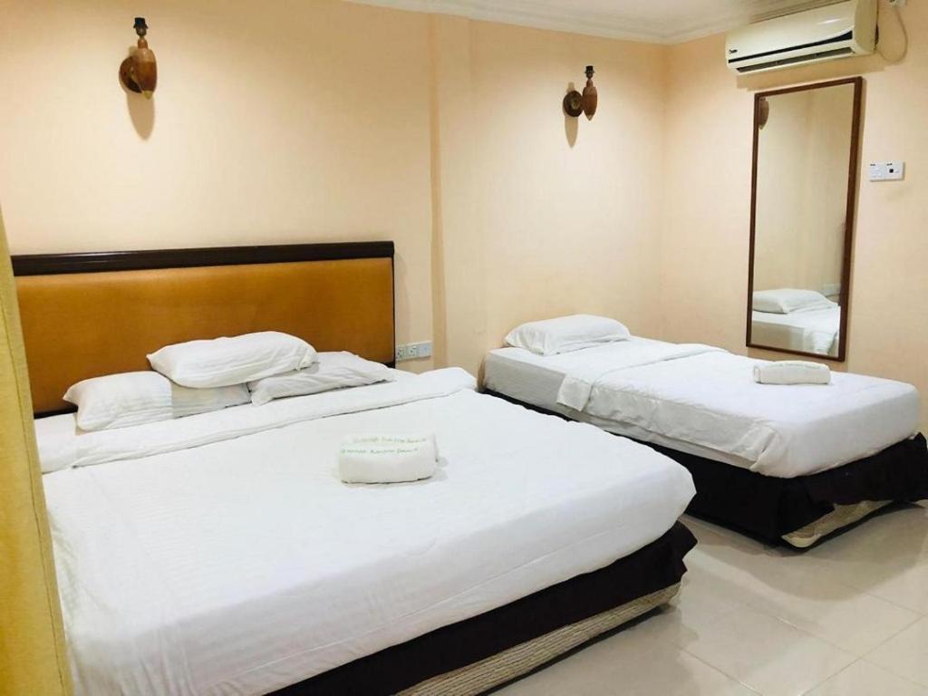 Penarak Bamboo Beach Motel Куах Экстерьер фото