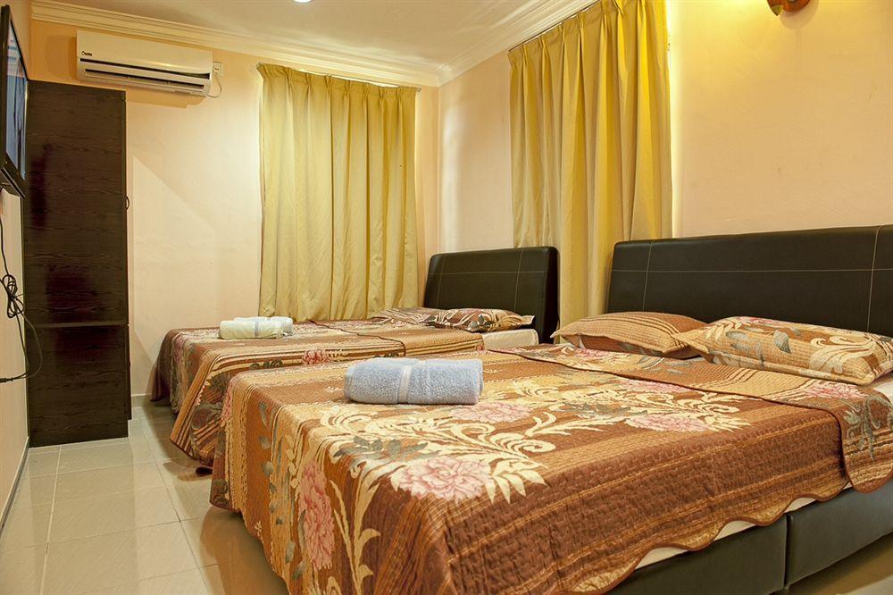 Penarak Bamboo Beach Motel Куах Экстерьер фото